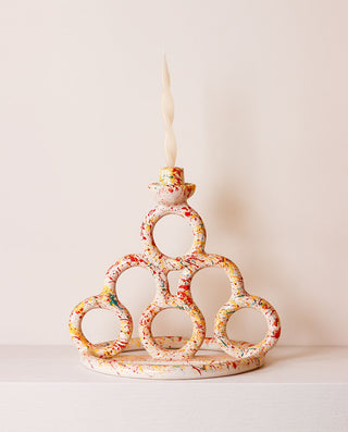 Ceramic candle holder with color splashes