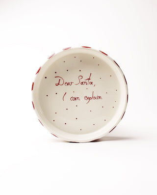 Ceramic plate with text 'Dear Santa, I can explain' on a white background