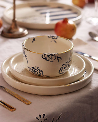 Ceramic bowl with floral design on a table setting
