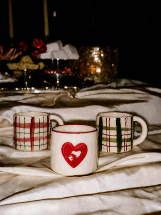 FESTIVE HAND PAINTED CERAMIC MUGS PERFECT IDEA OR A CHRISYMAS GIFT ON A TABLE