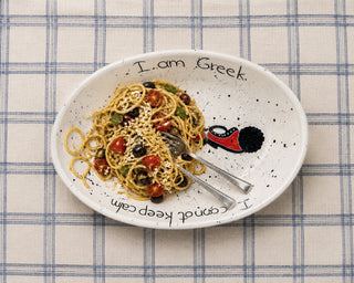 Greek pasta on a handcrafted serving platter