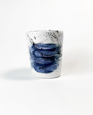 Ceramic mug with Greek flag abstract design on a white background