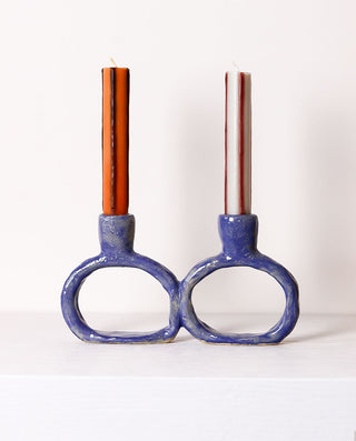 Handmade ceramic candle holder in blue with modern circular design