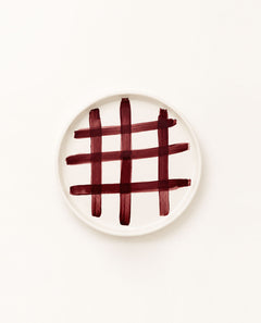 Hand-painted burgundy check ceramic dessert plate from the POMONA Collection